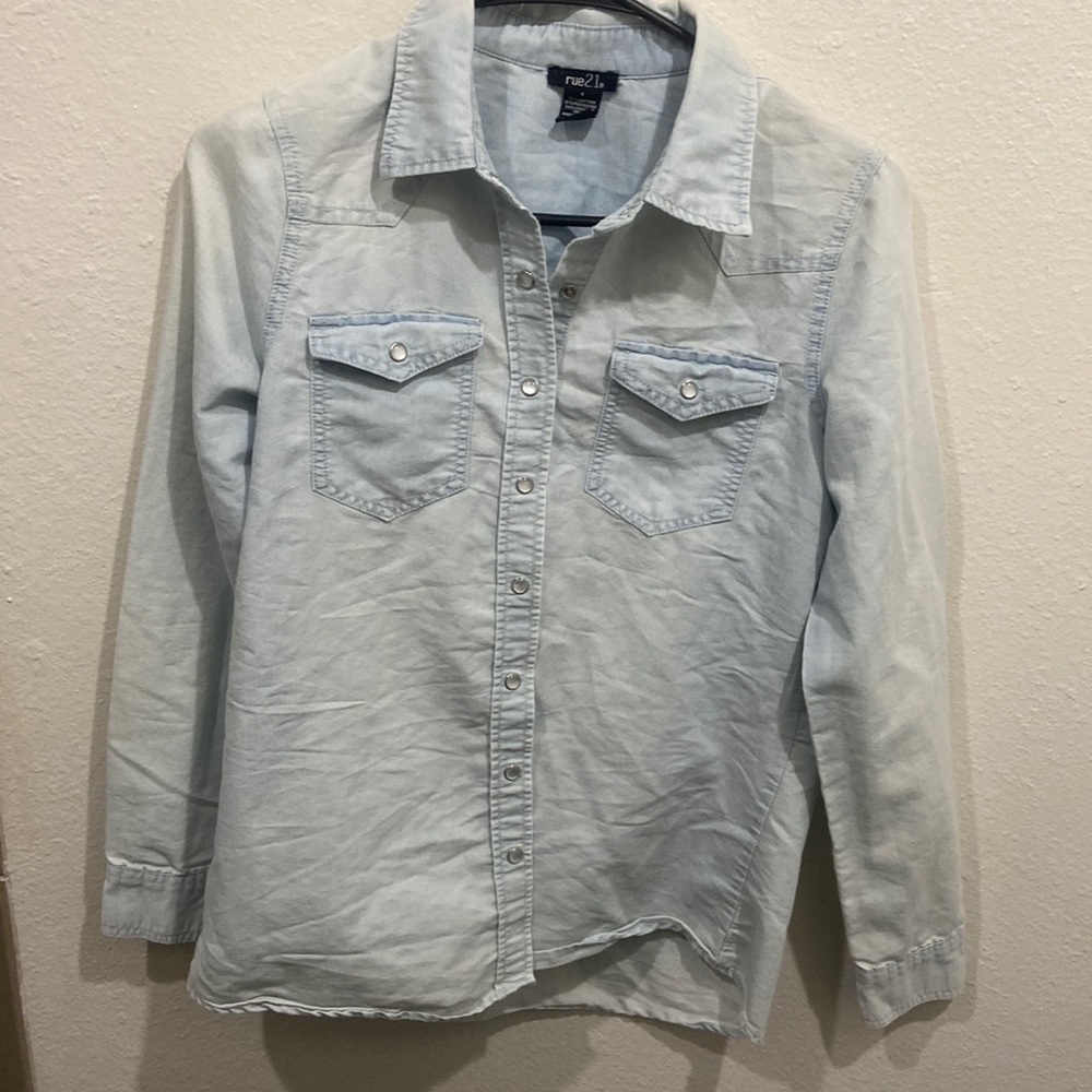 Denim material button up. With iridescence buttons